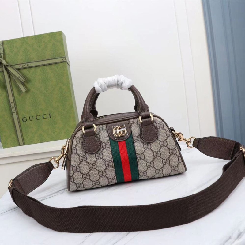 G*u*i top handle bags